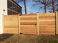 <b>6 foot Horizontal cedar fencing with no spacing between the pickets and single flat top walk gate</b>